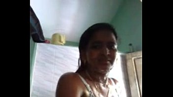 Indian girl taking self video when bathing